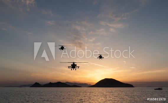 Picture of Attack helicopter on the sun set